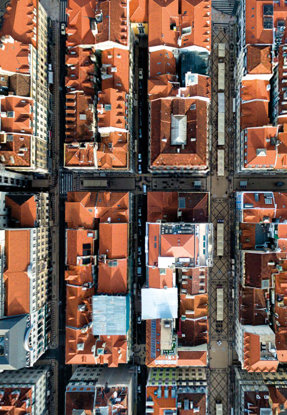 Fotografia aérea de um bairro na cidade de Lisboa.